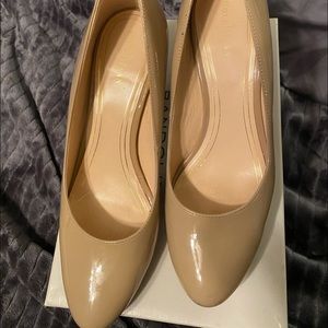 Cole Haan creme parent pumps